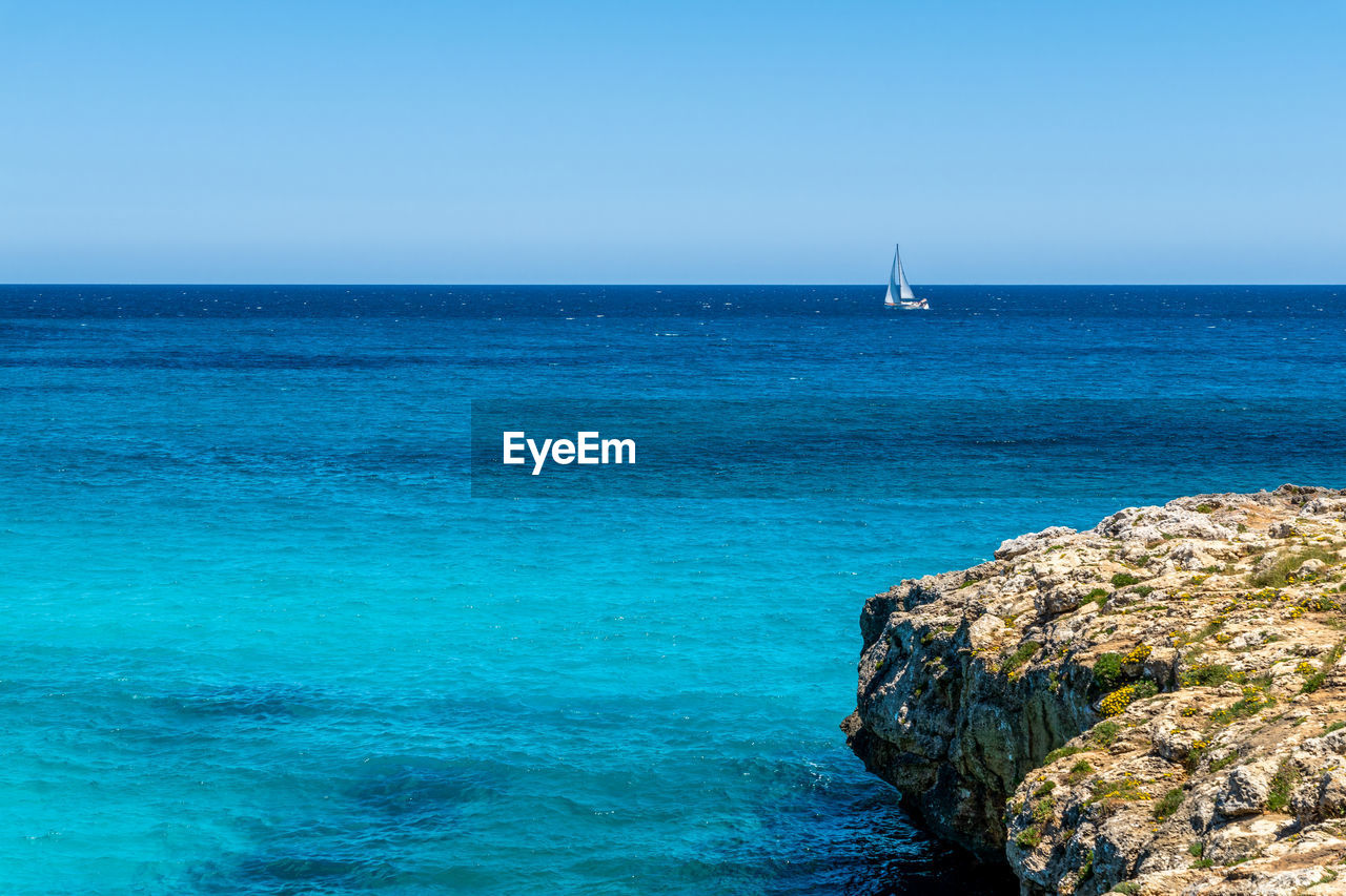 Sailing yacht at the sea with blue sky summer