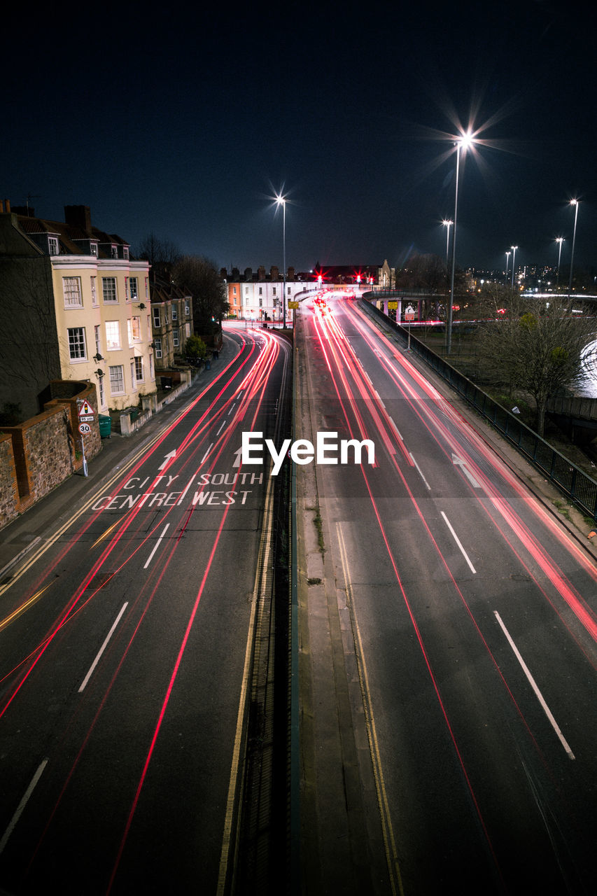 High angle view of light trails on city street