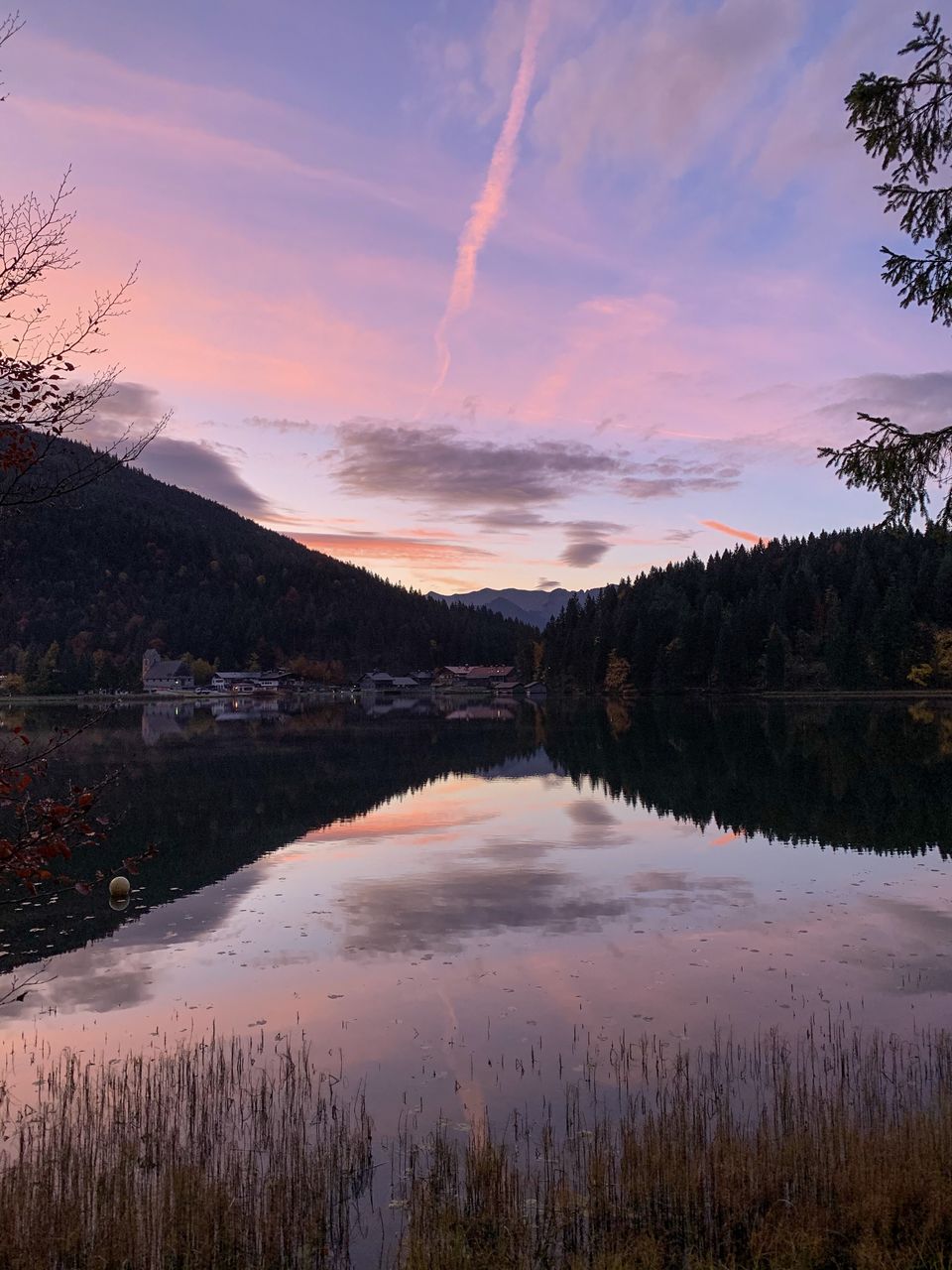 Scenic view of lake against sky during sunset