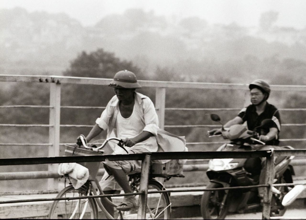 WOMAN SITTING ON BENCH