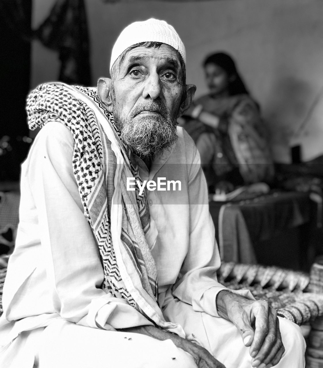 Portrait of senior man sitting