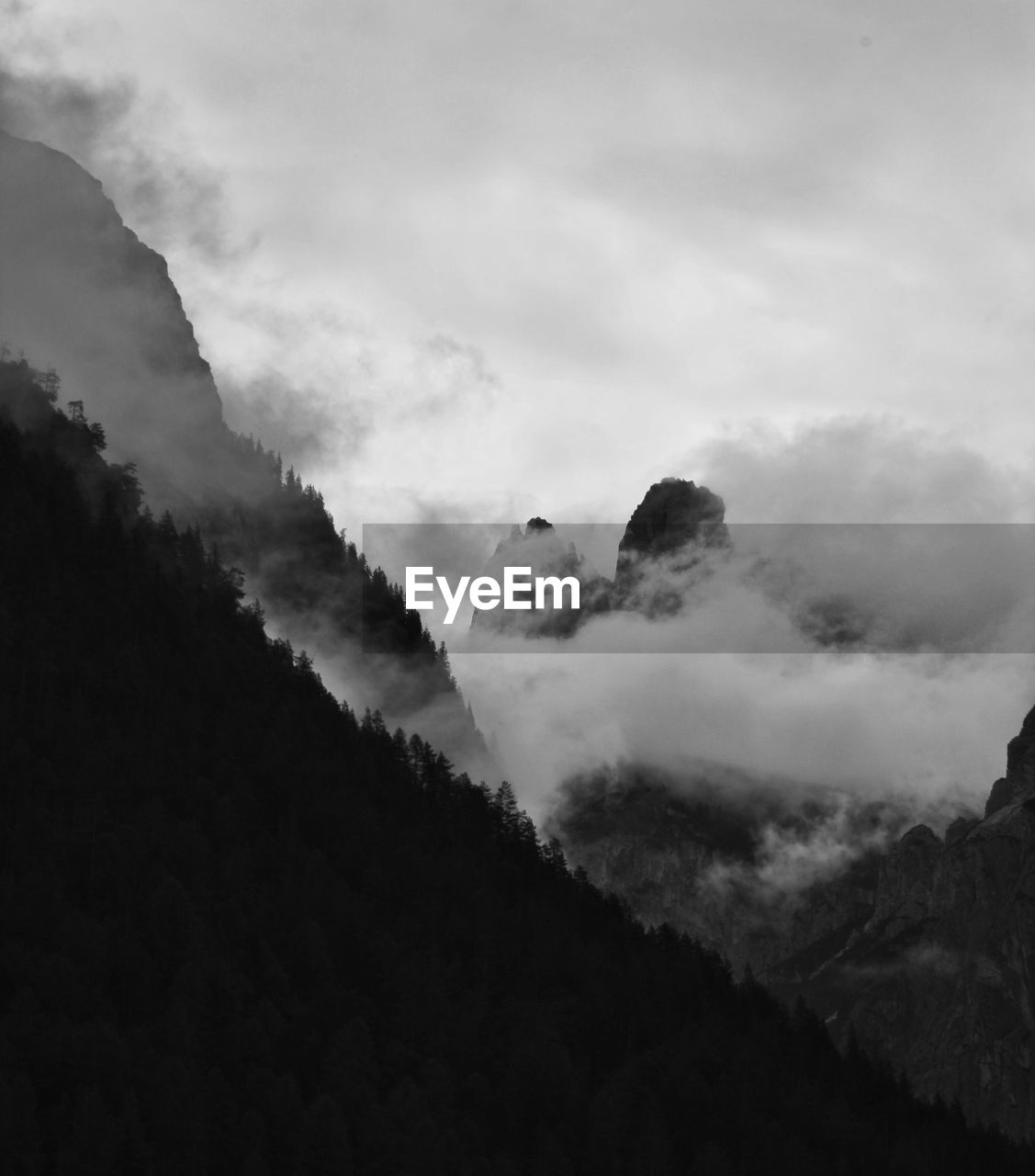 Low angle view of silhouette mountain against sky