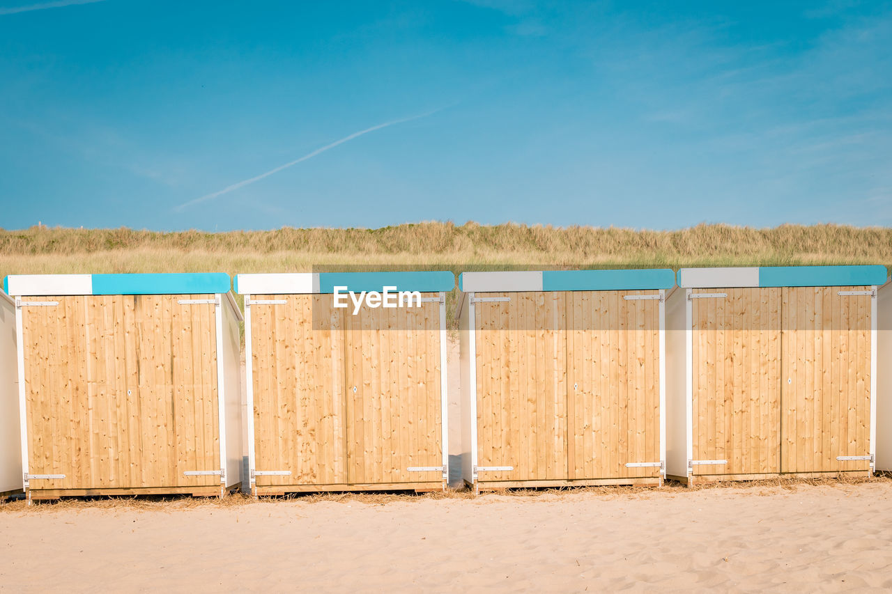 View of beach against blue sky, bergen aan zee netherlands 