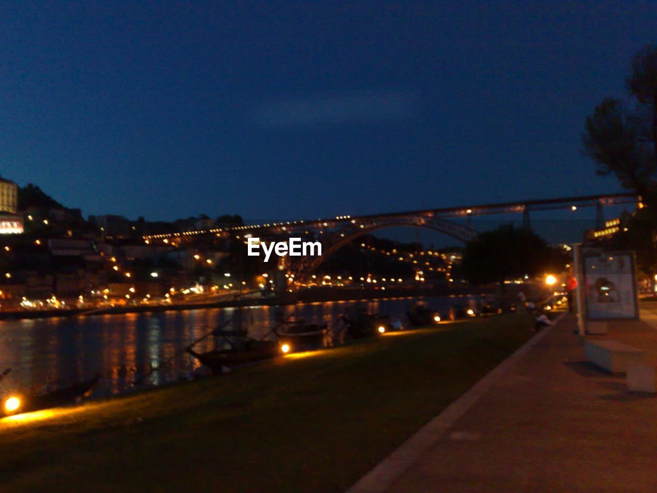 VIEW OF ILLUMINATED STREET LIGHT AT NIGHT