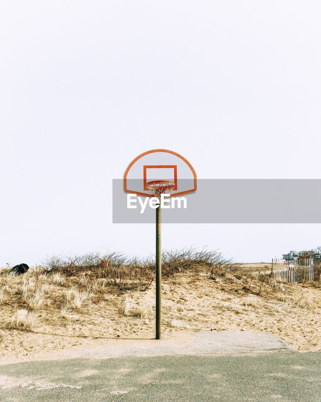 Basketball hoop at court against clear sky