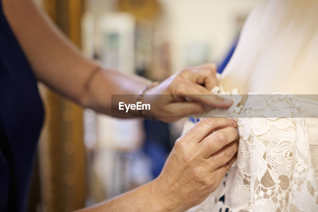 Cropped image of designer working at workshop