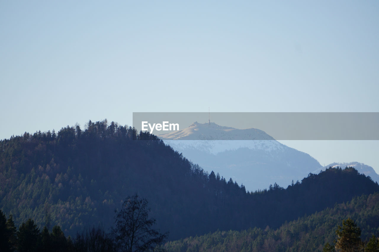 Scenic view of mountains against clear sky