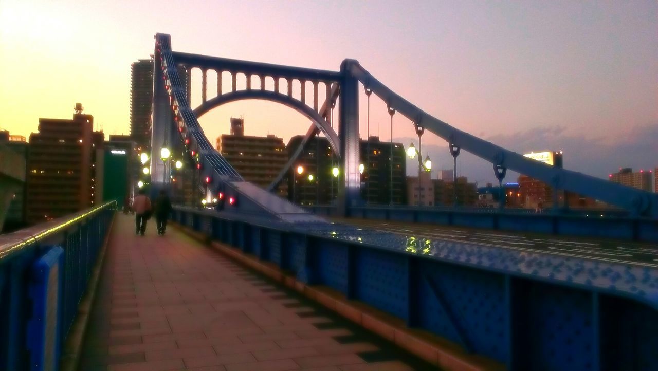 SUSPENSION BRIDGE AT SUNSET