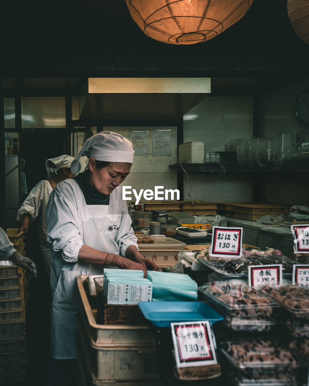 MAN WORKING AT STORE