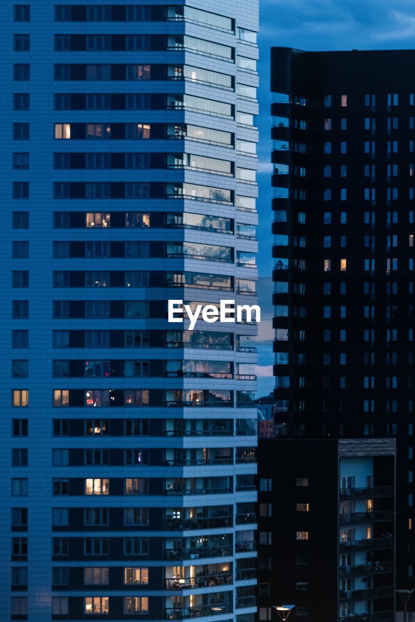 Full frame shot of modern building at night