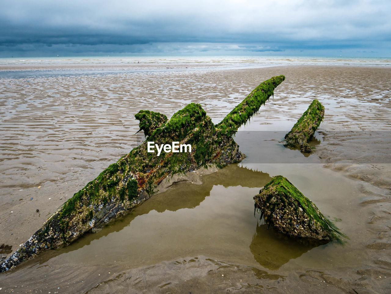 Sword like leftovers from a world war ship at a beach in northern france