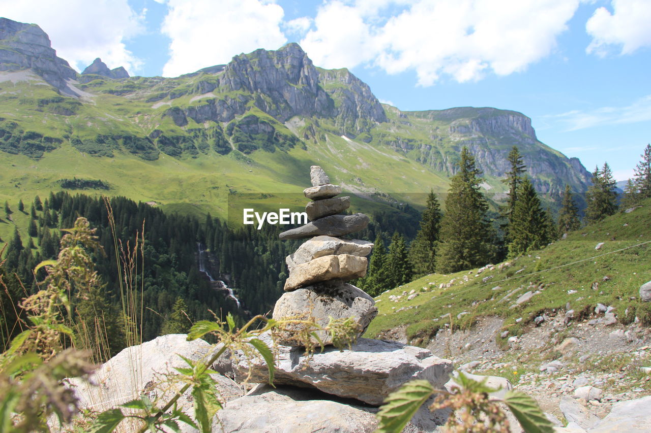 Scenic view of rocky mountains against sky