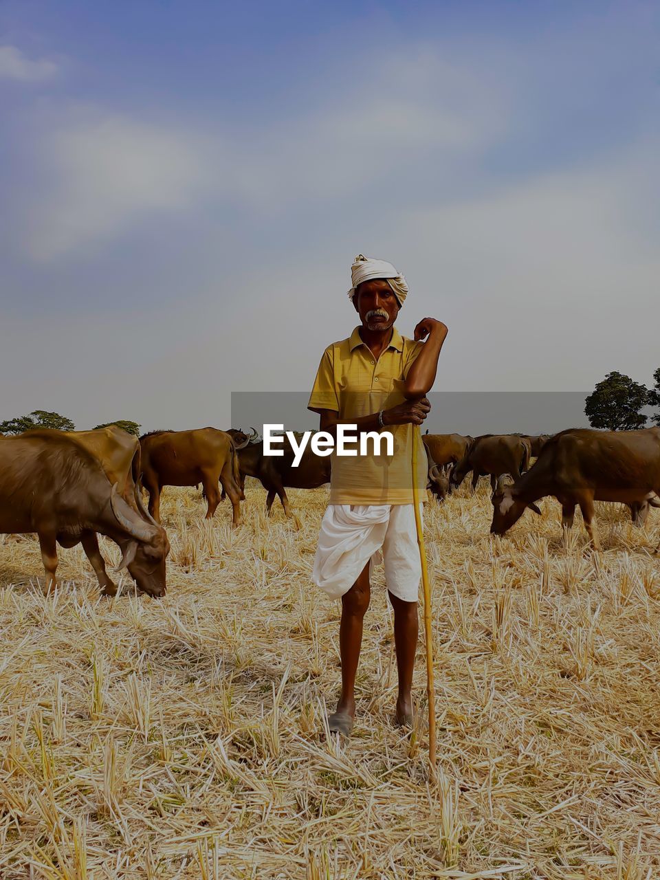 Full length of man standing on field