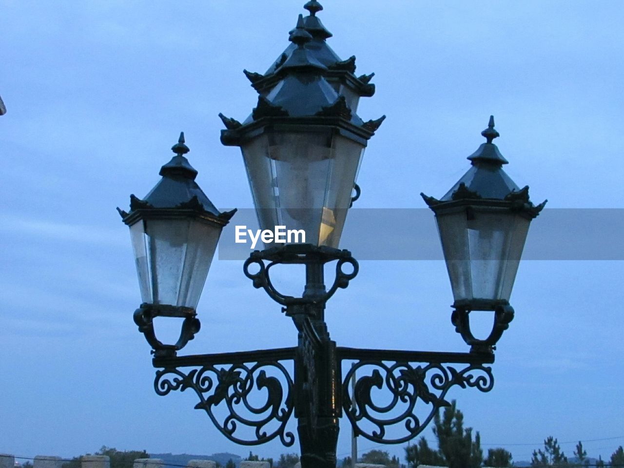 LOW ANGLE VIEW OF LAMP POST AGAINST SKY