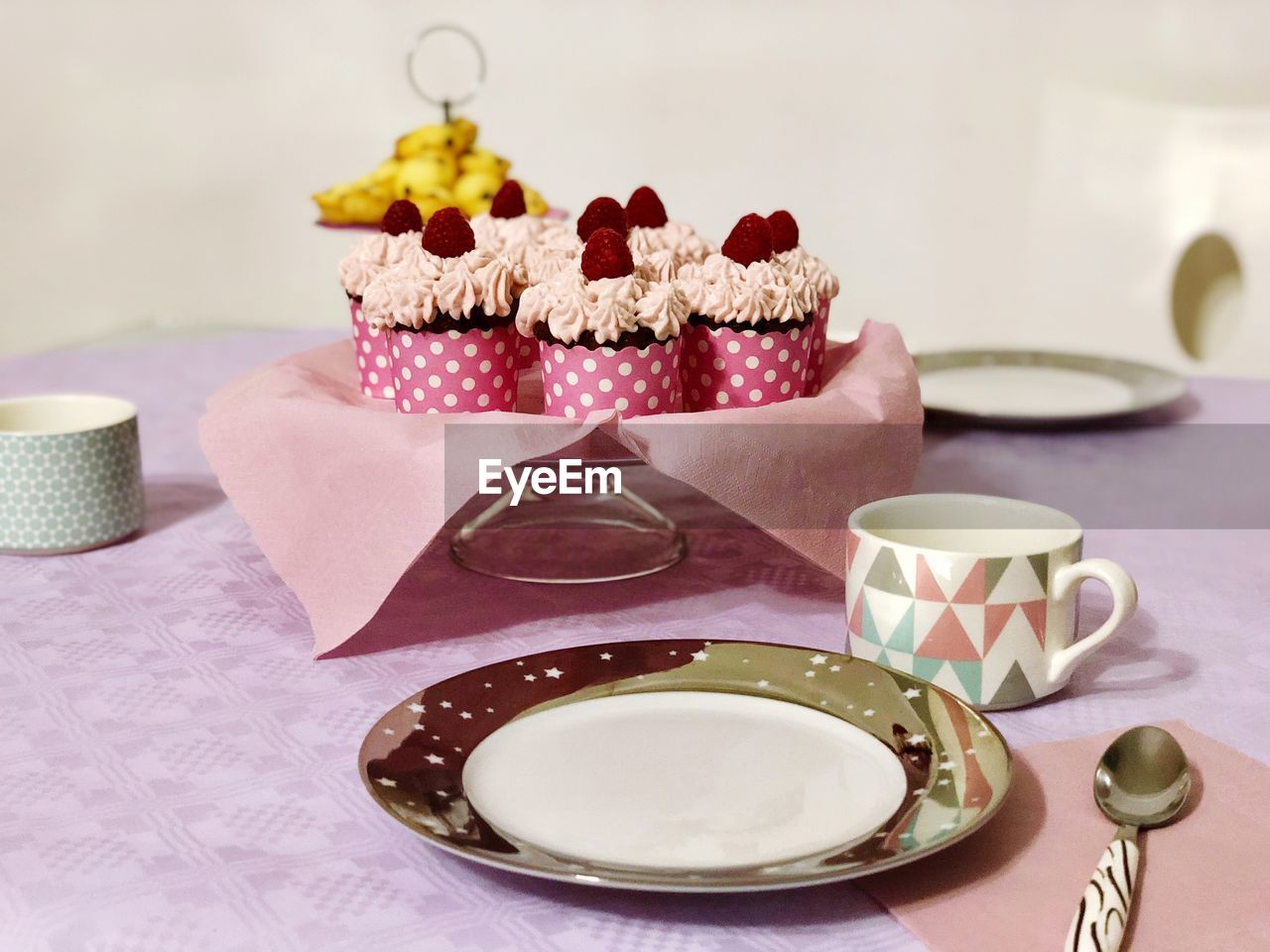 Close-up of cupcakes served on table