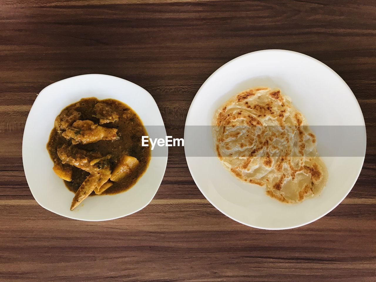 HIGH ANGLE VIEW OF MEAL SERVED IN PLATE ON TABLE