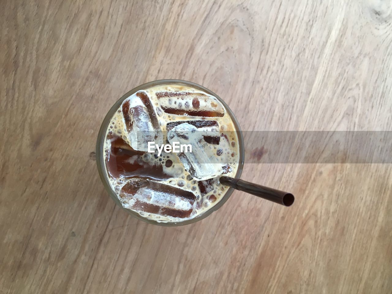 HIGH ANGLE VIEW OF ICE CREAM IN GLASS ON TABLE