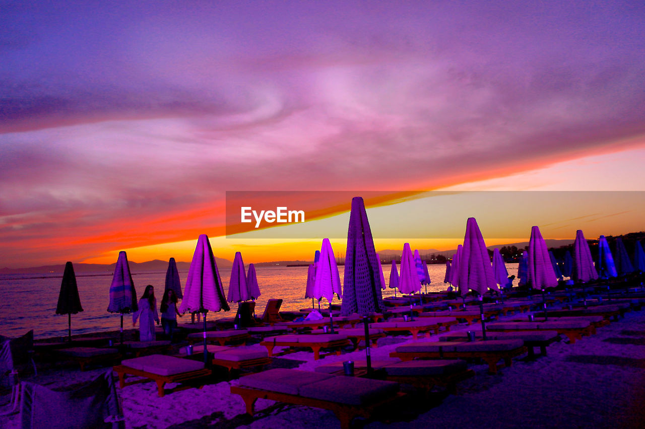 Panoramic view of beach against sky during sunset