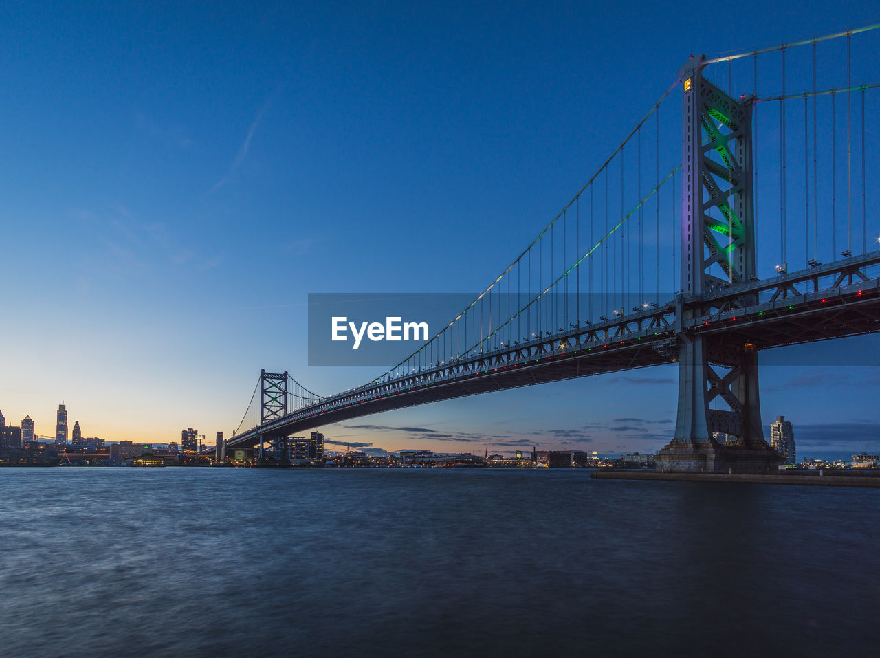 View of oakland bay bridge over river