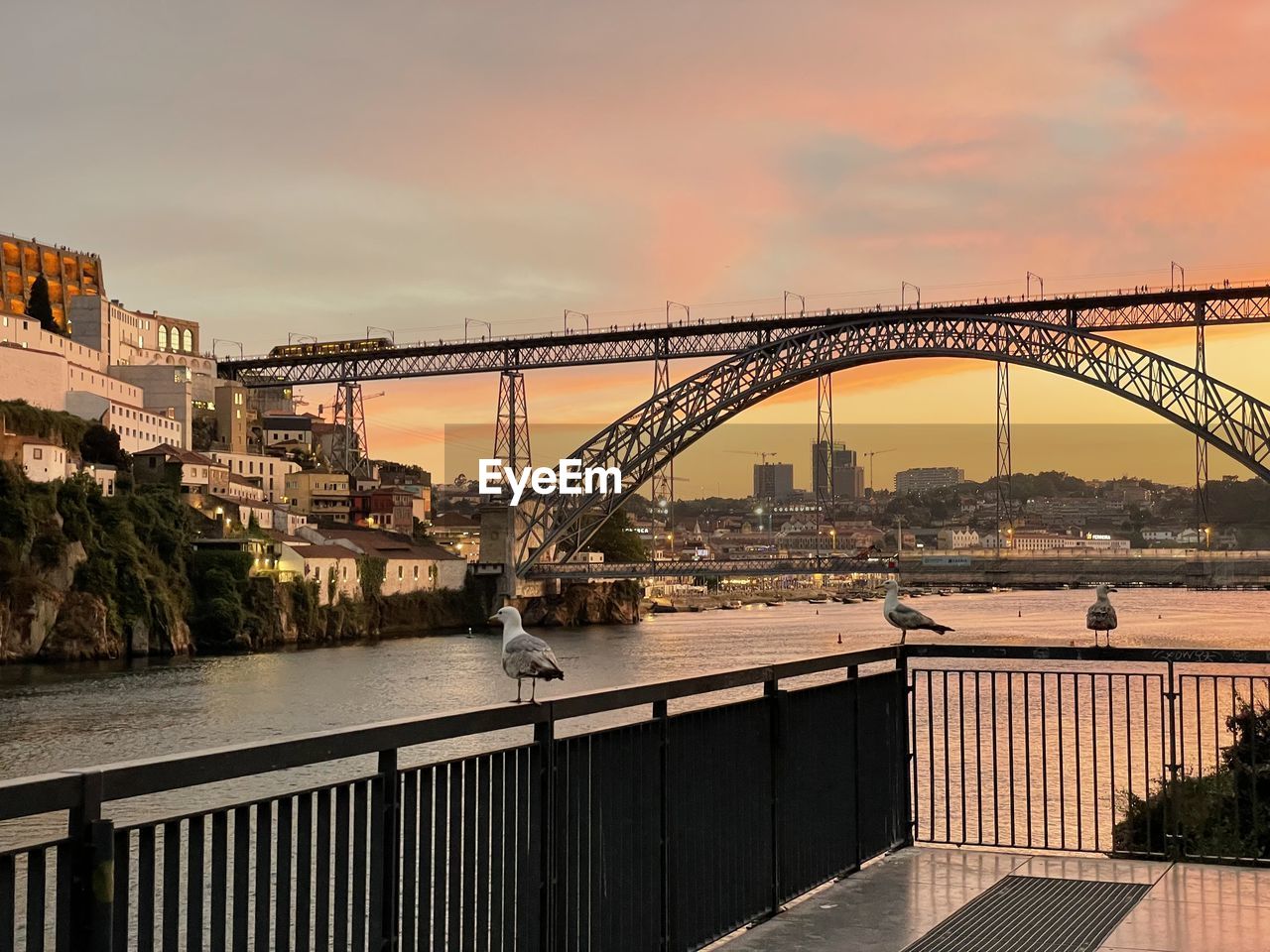 Bridge over river against sky