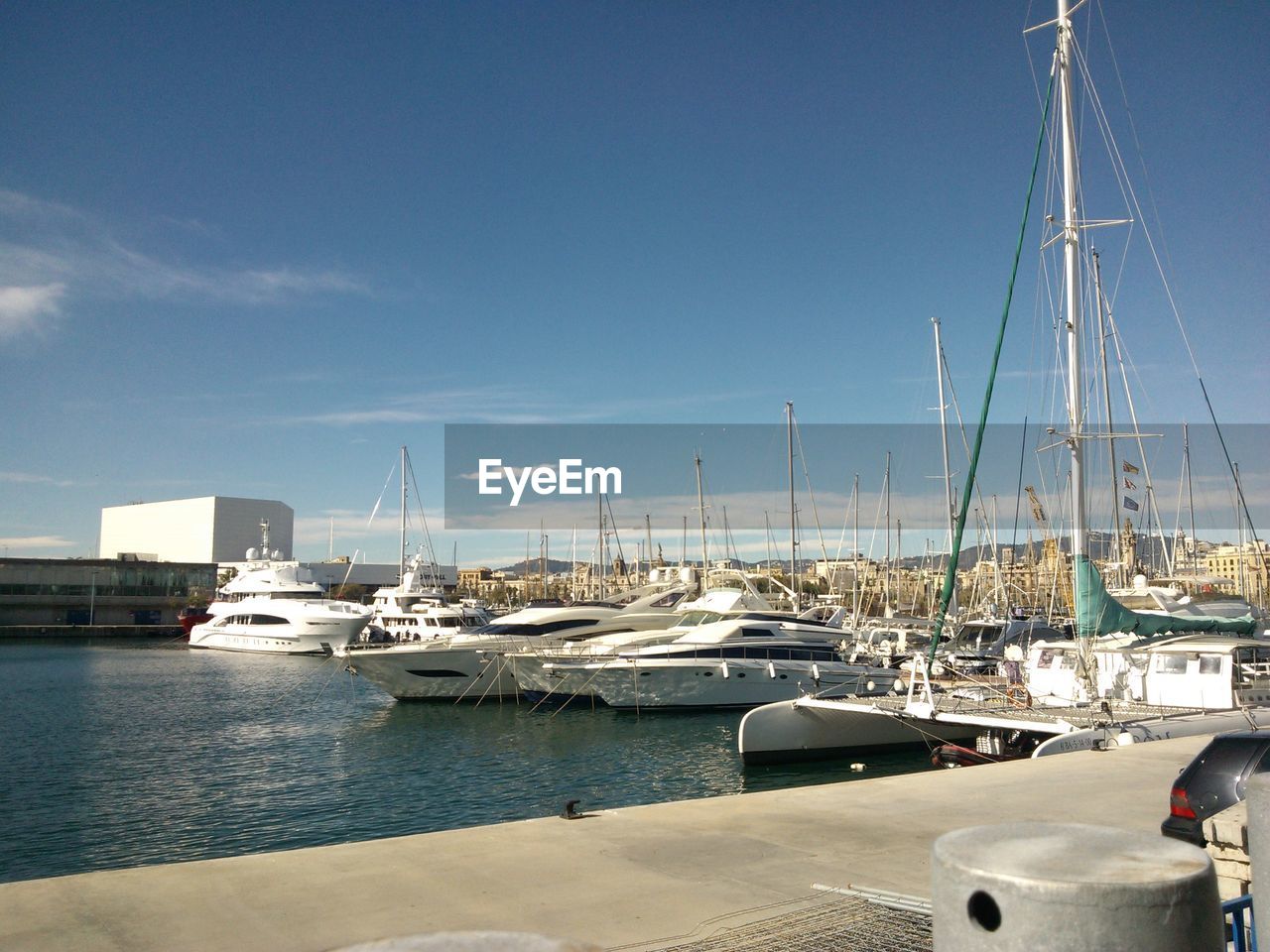 BOATS MOORED IN SEA