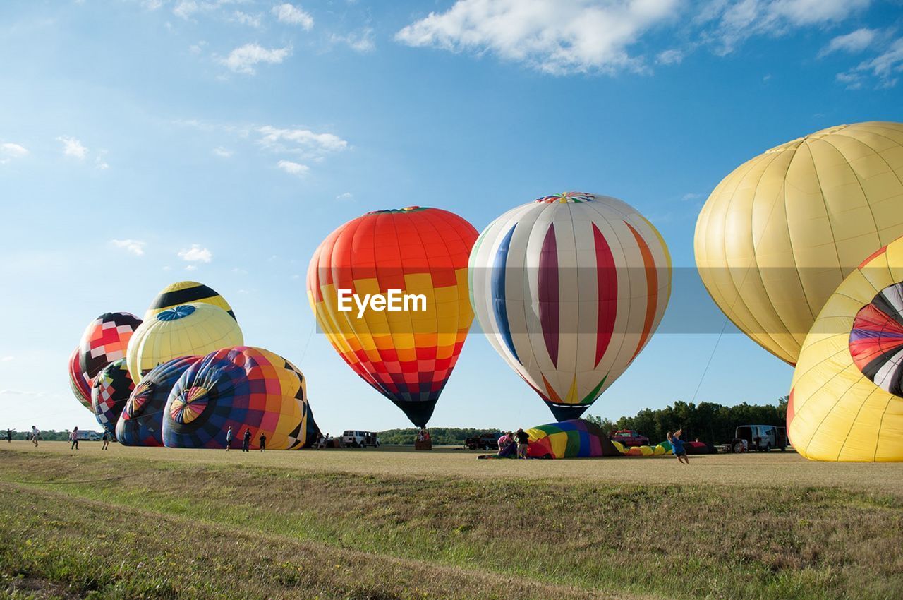 Hot air balloons flying at sunset