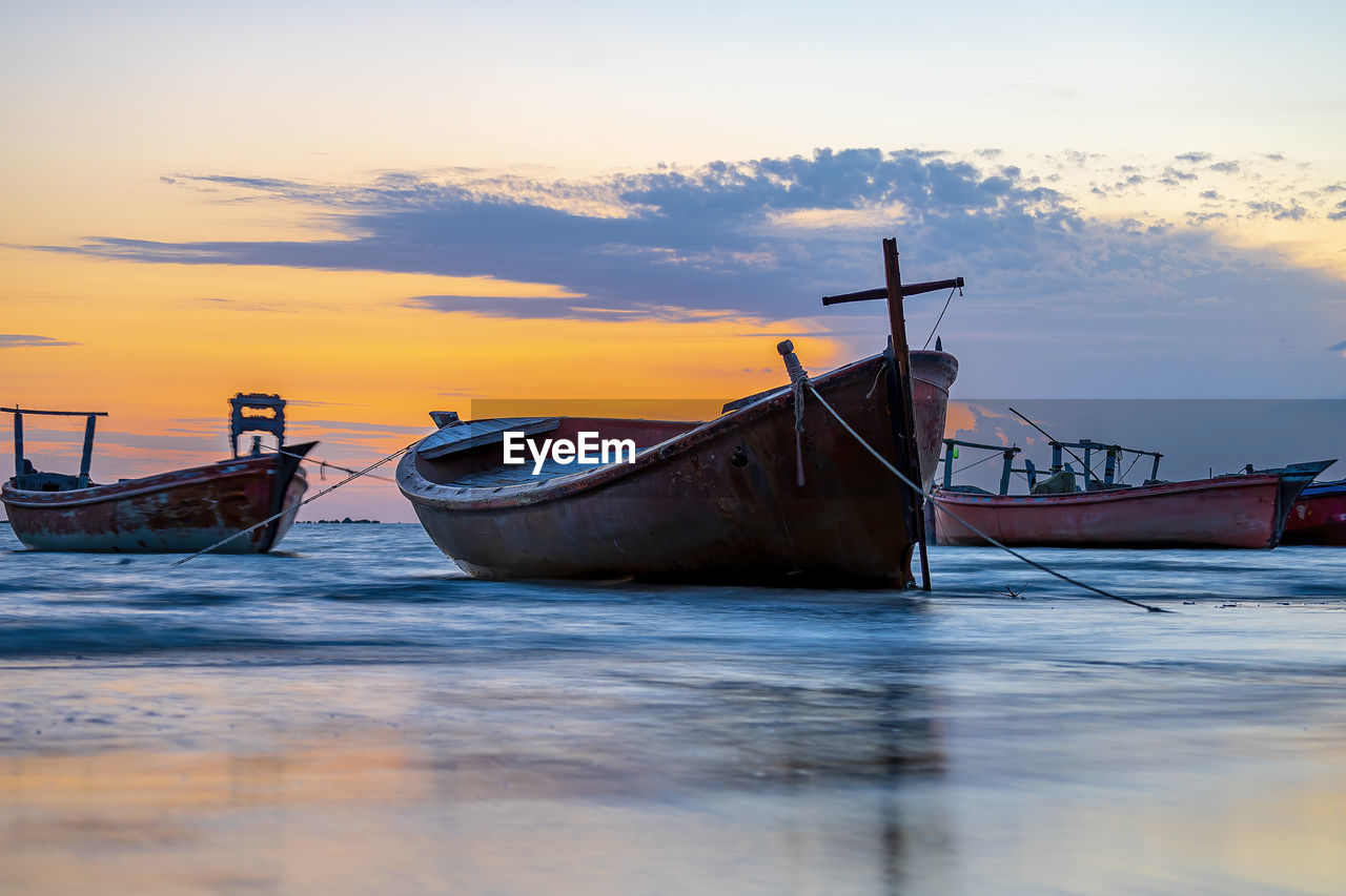 Sunset view with cloudy sky at gadani beach with dhow boat