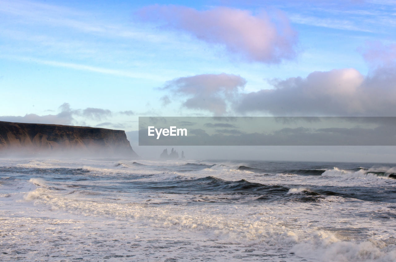 PANORAMIC SHOT OF SEA WAVES AGAINST SKY