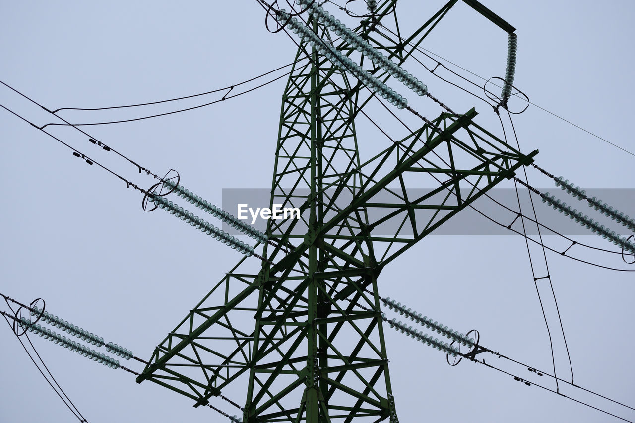 low angle view of electricity pylon