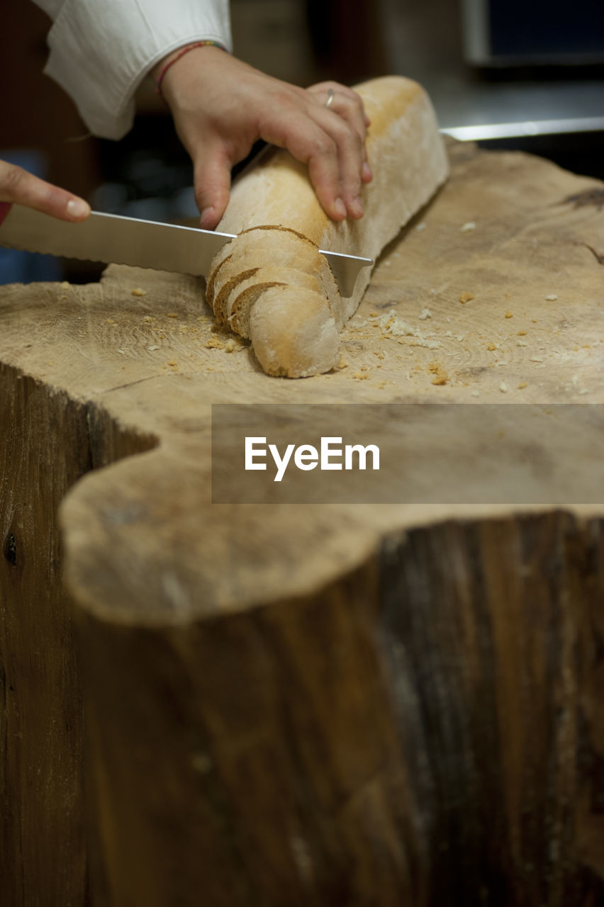 Midsection of person preparing food