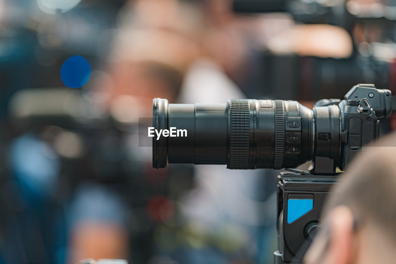 Camera at a live media conference.