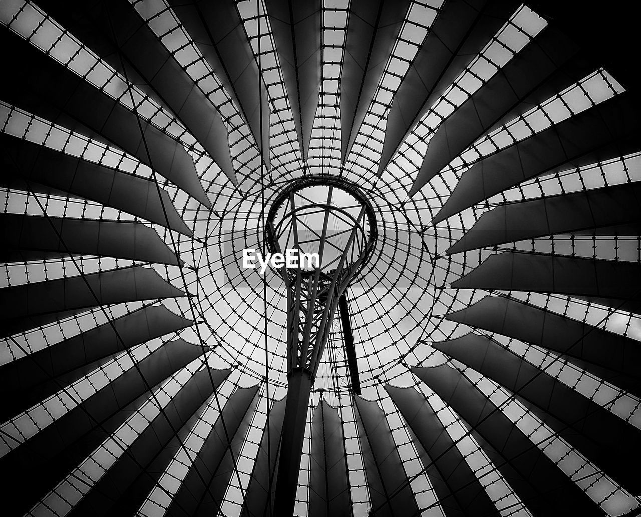 LOW ANGLE VIEW OF ILLUMINATED MODERN OFFICE