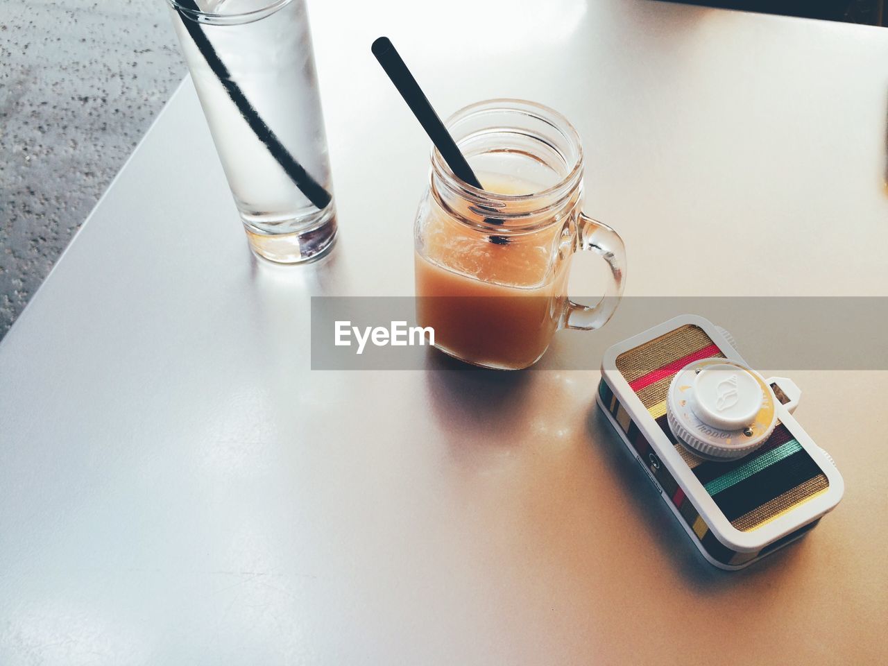 High angle view of juices in glass on table