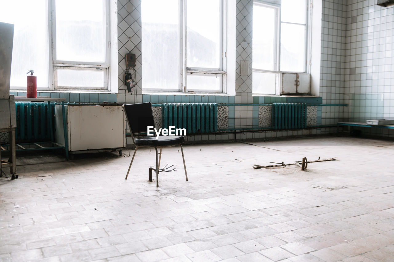 EMPTY SEATS IN ABANDONED BUILDING