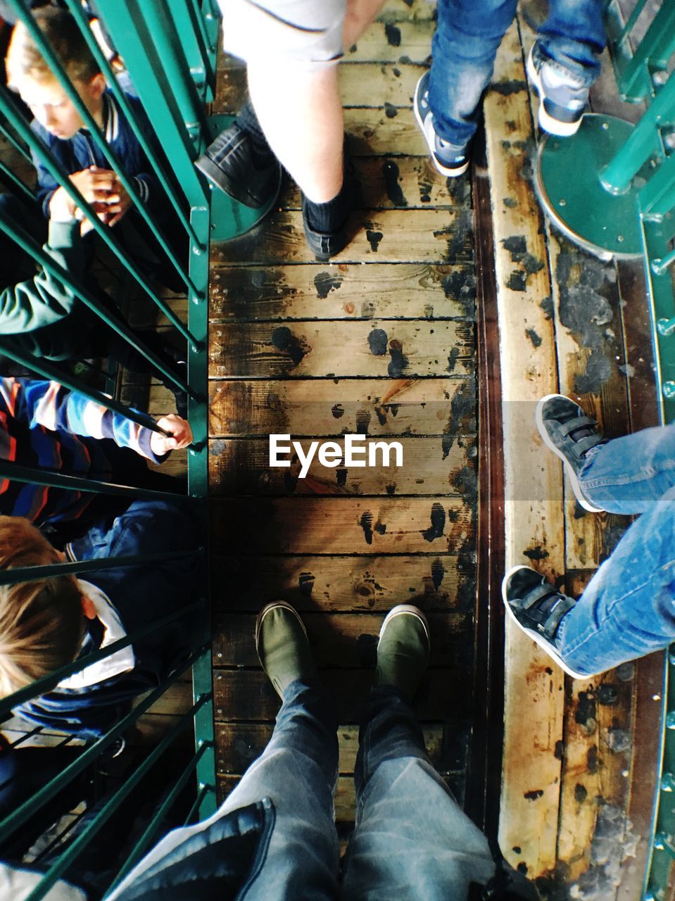 People waiting in line at amusement park