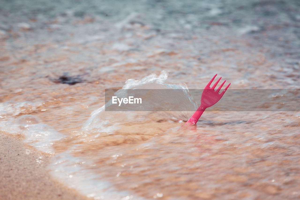 High angle view of chocolate on sand