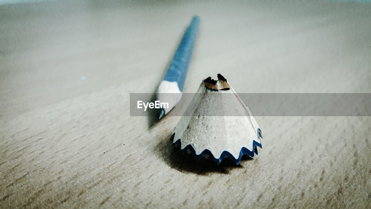 Close-up of pencil shaving on table