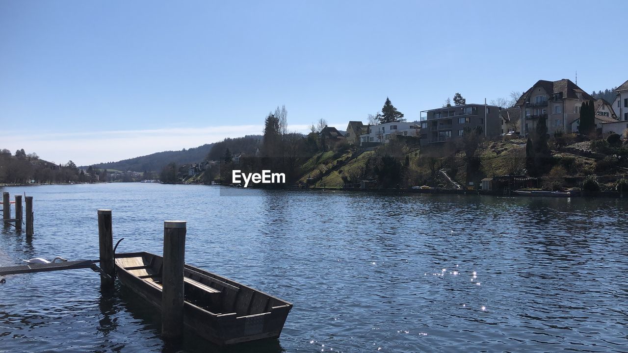 SCENIC VIEW OF LAKE AGAINST BUILDINGS