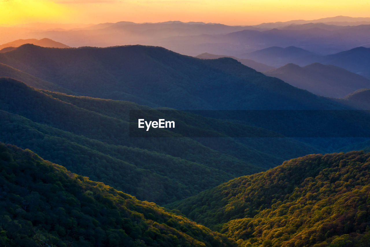 Scenic view of mountains during sunset