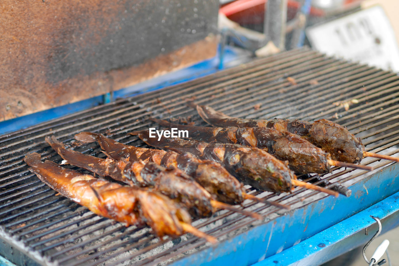 close-up of seafood on barbecue grill