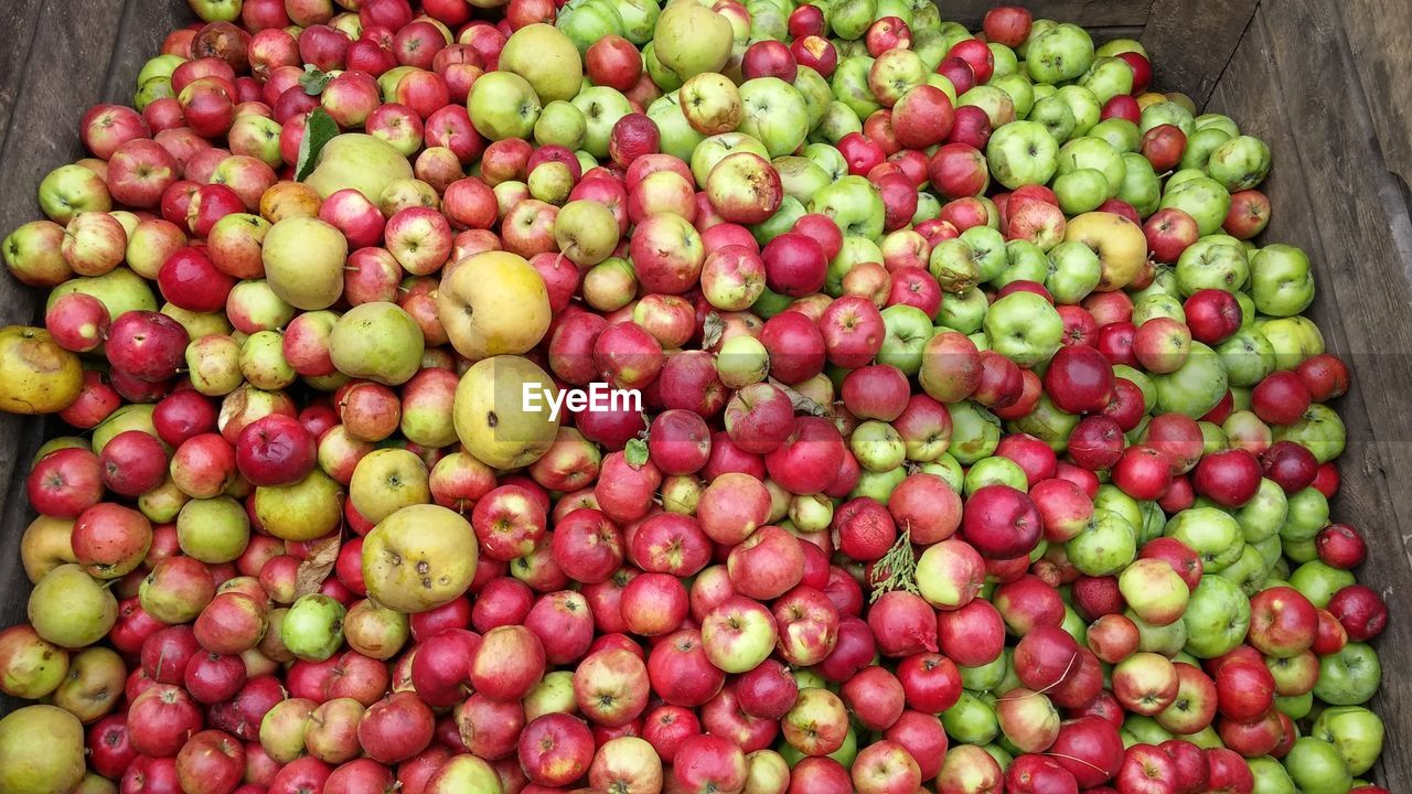 High angle view of apples in wooden box