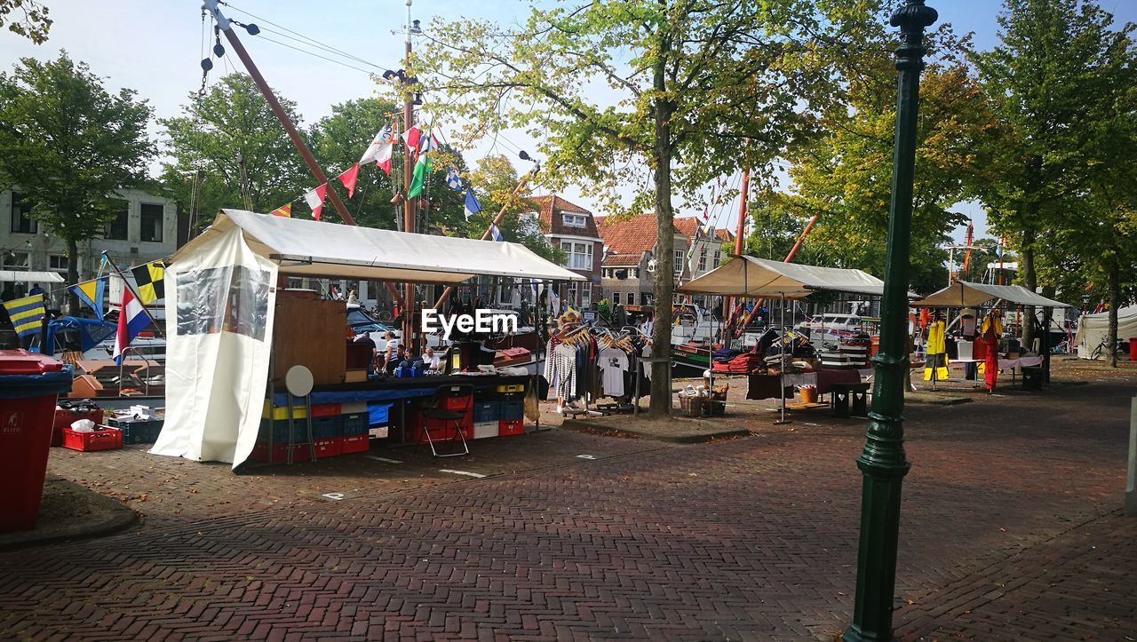 VIEW OF MARKET STALL AGAINST SKY