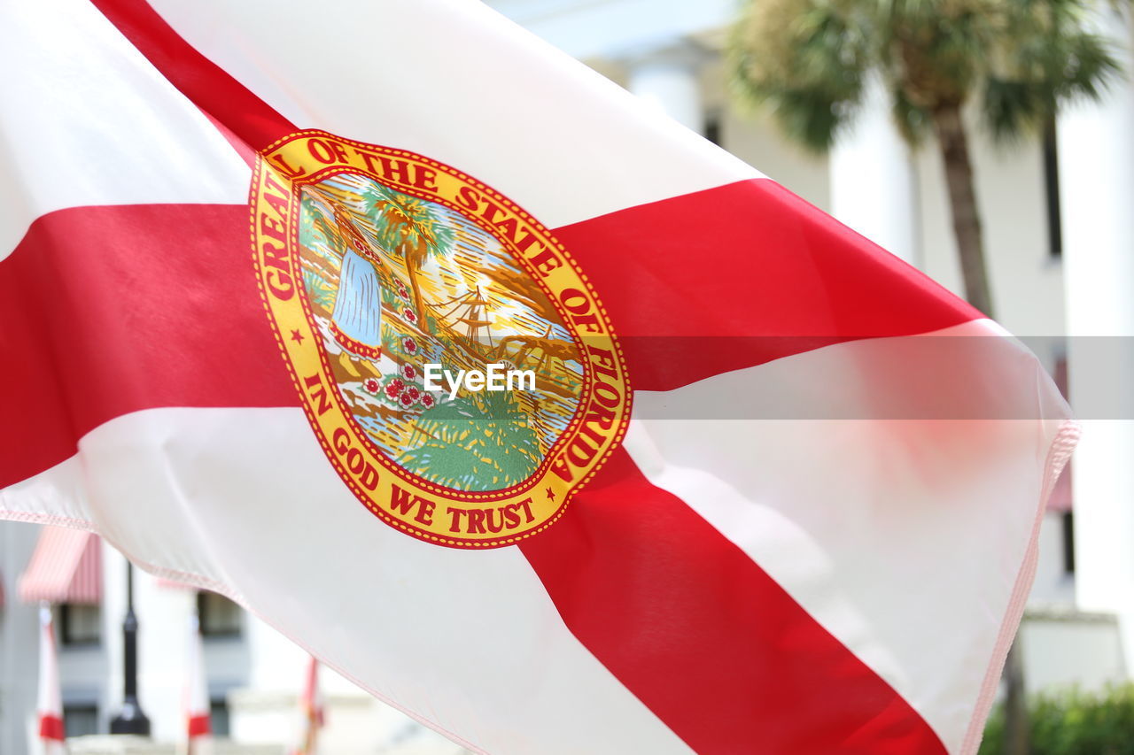 Close-up of florida state flag against building 