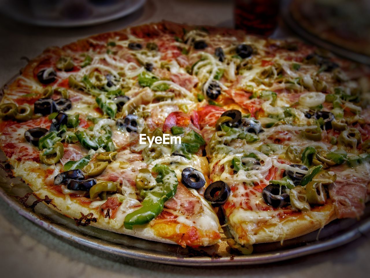 Close-up of pizza served in plate