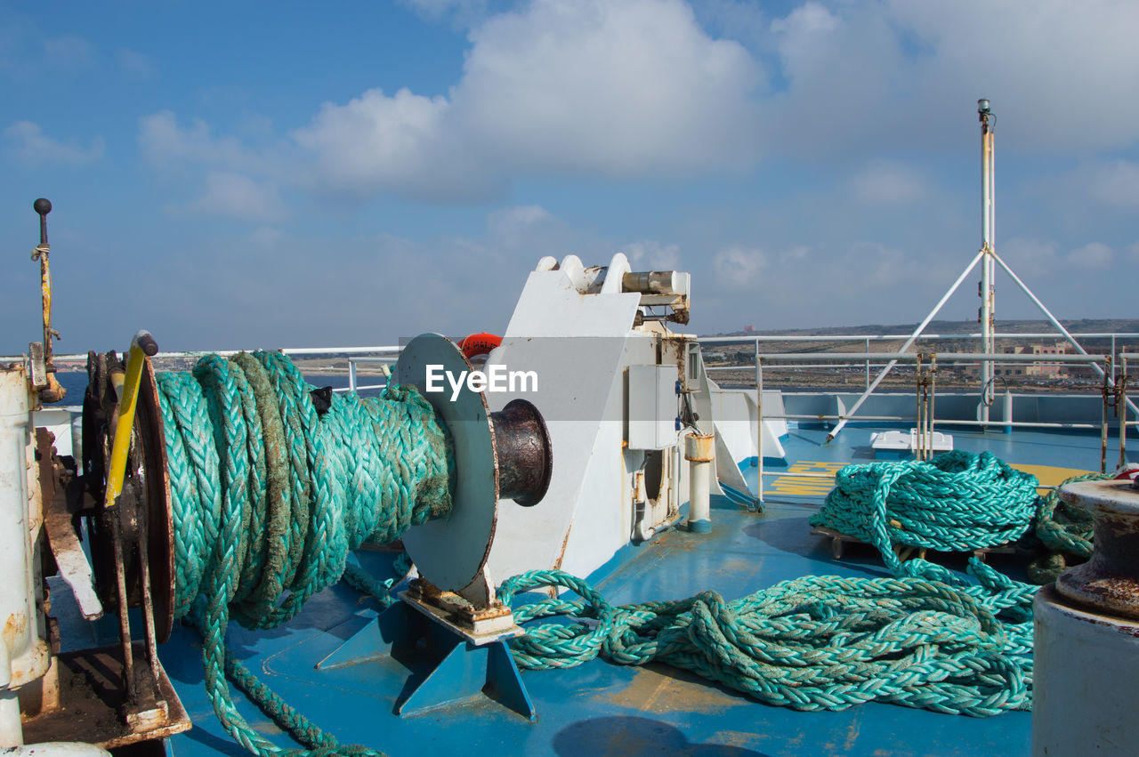Close-up of ropes on boat deck