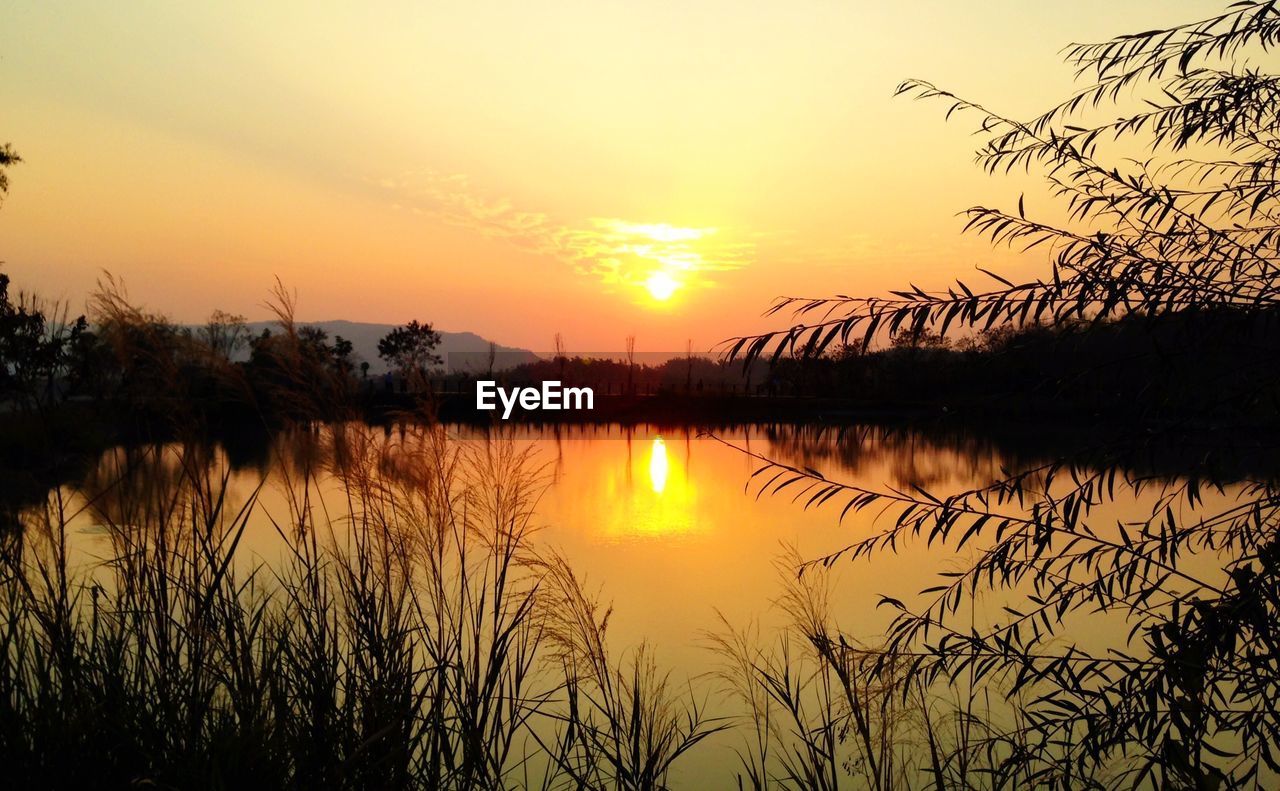 View of lake at sunset