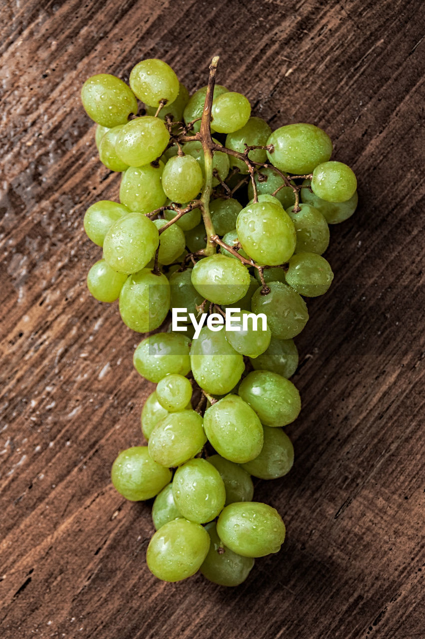 Close-up of grapes on table