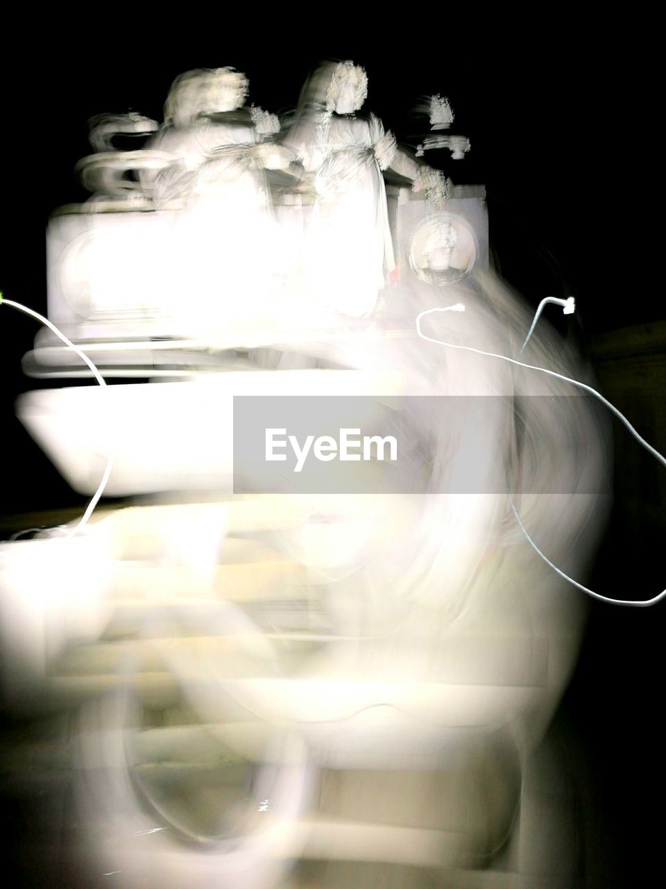 CLOSE-UP OF BLURRED MOTION OF VEHICLE
