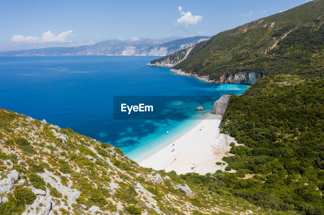 HIGH ANGLE VIEW OF BAY ON BEACH