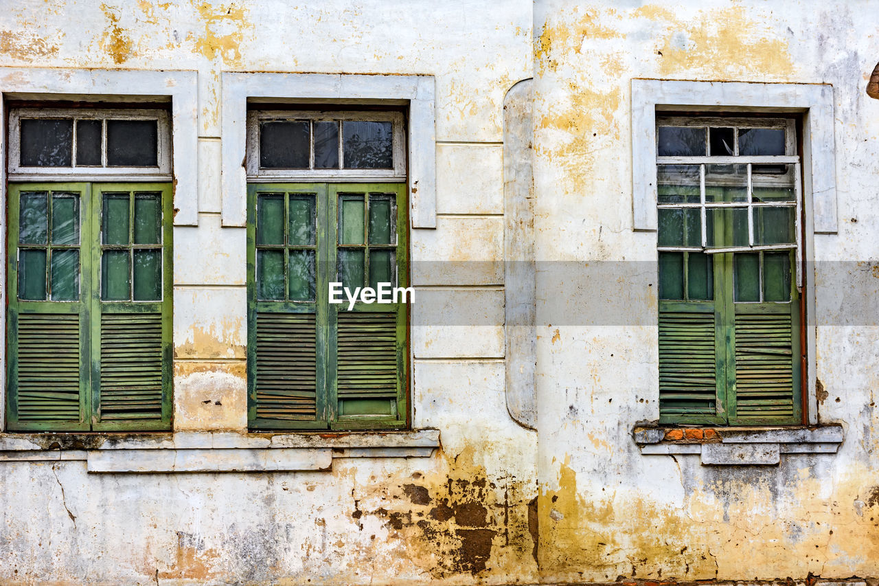 Windos of old and damaged house